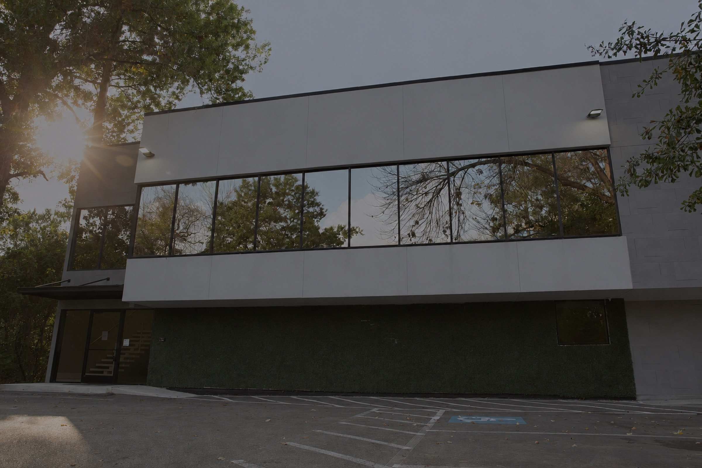 Modern building exterior with large windows.