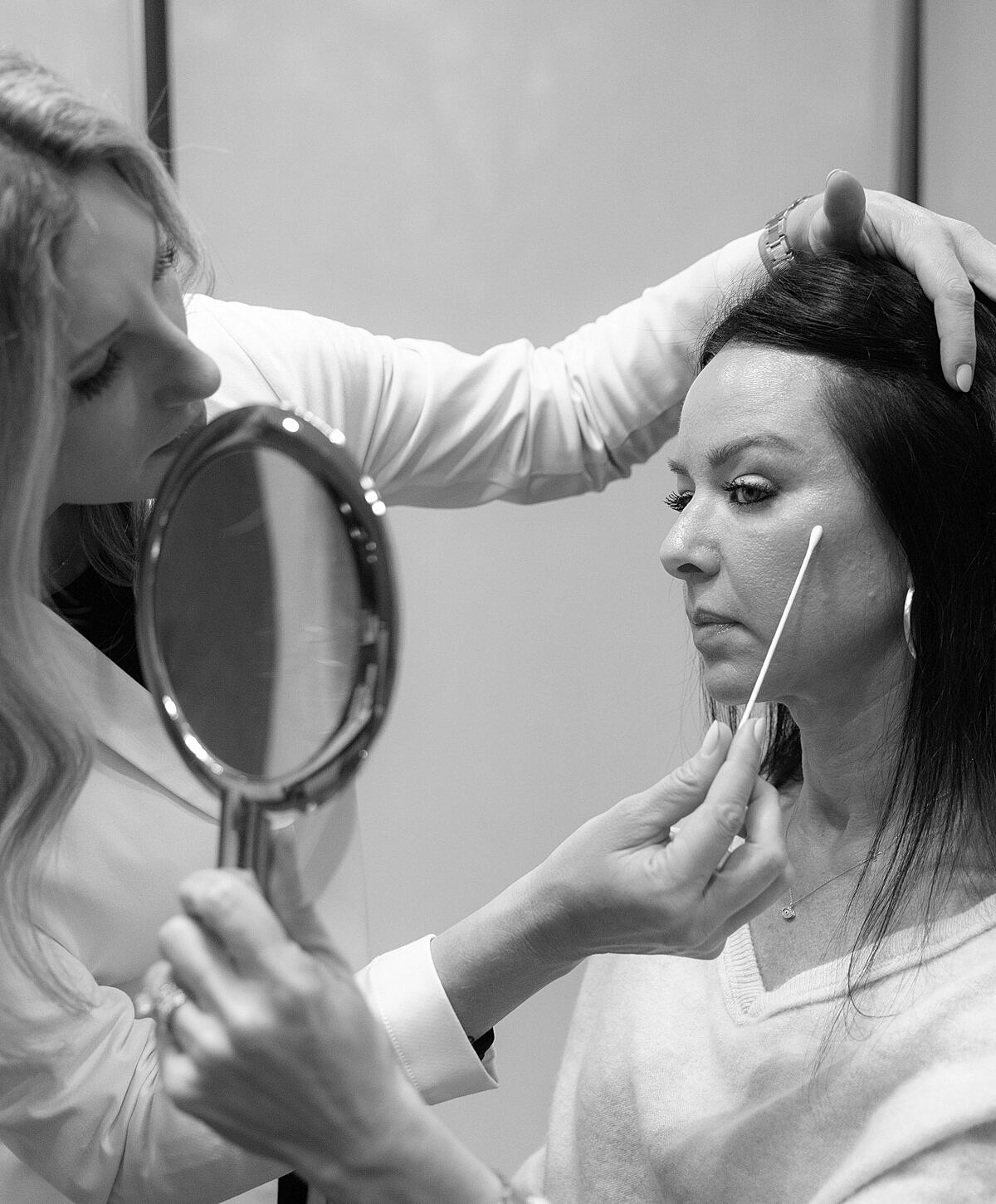 Beauty treatment session in black and white.