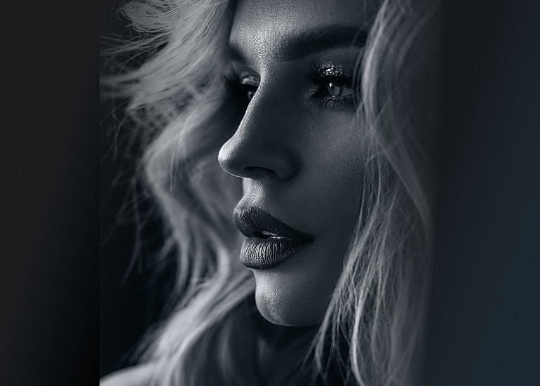 Black and white portrait of a woman.