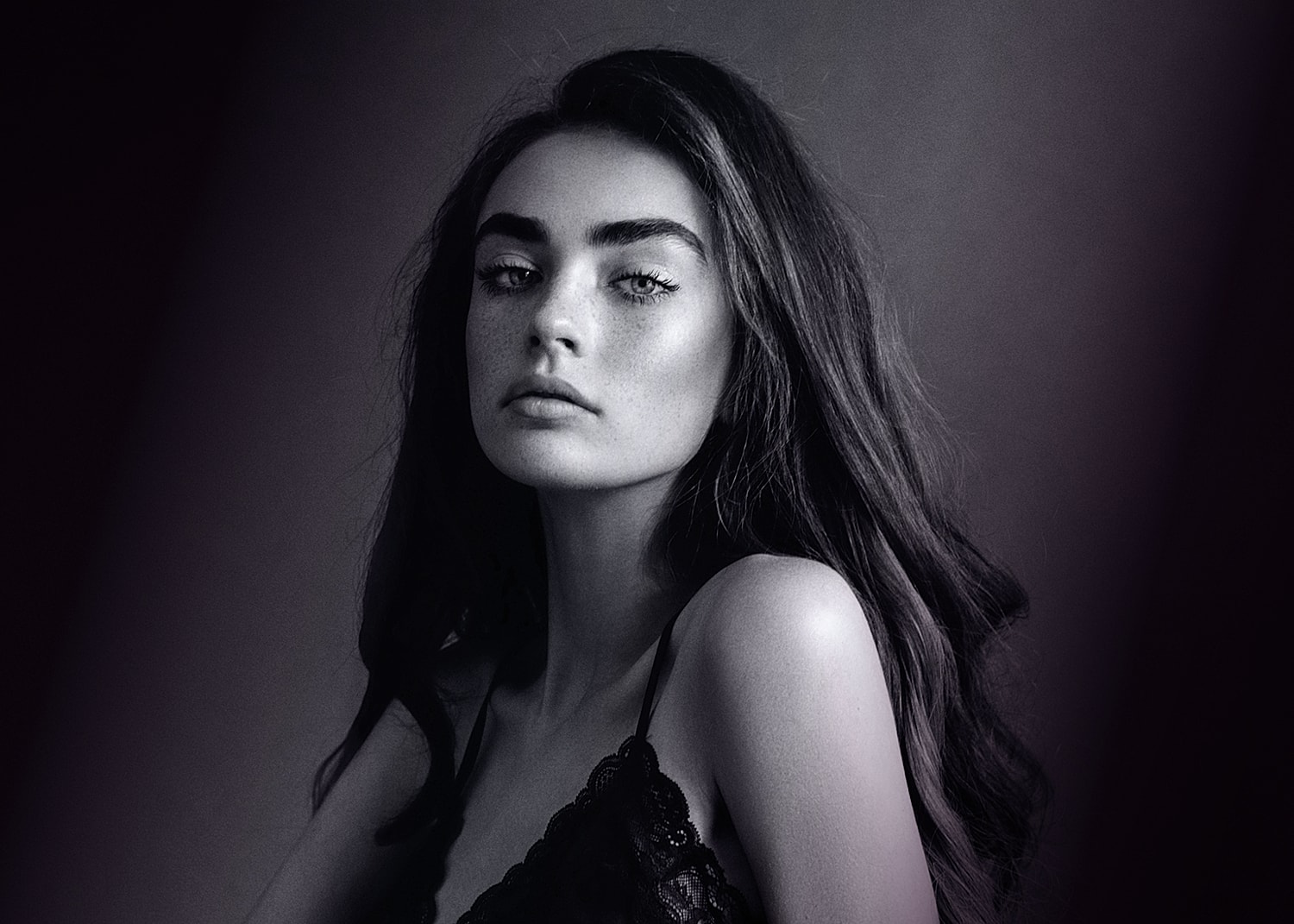Black and white portrait of a woman.