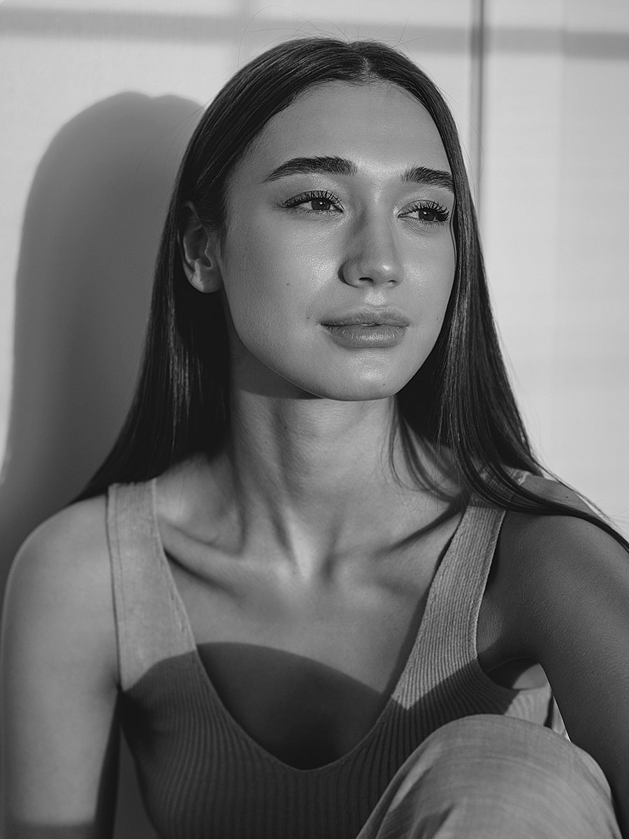 Portrait of a woman in soft lighting.