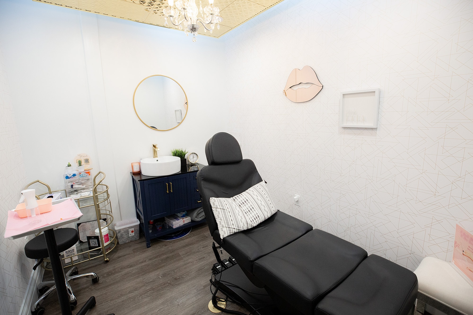 Cosmetic treatment room with modern decor.