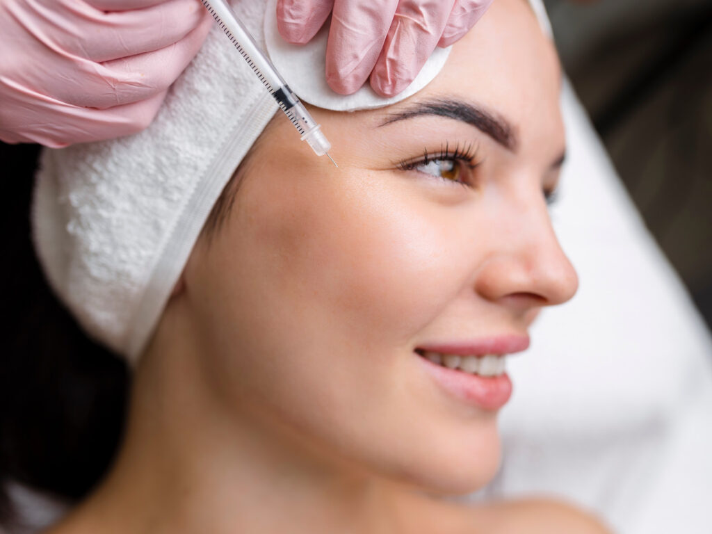 houston plastic surgery model receiving an injectable