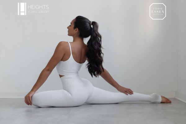 woman doing yoga in white clothing